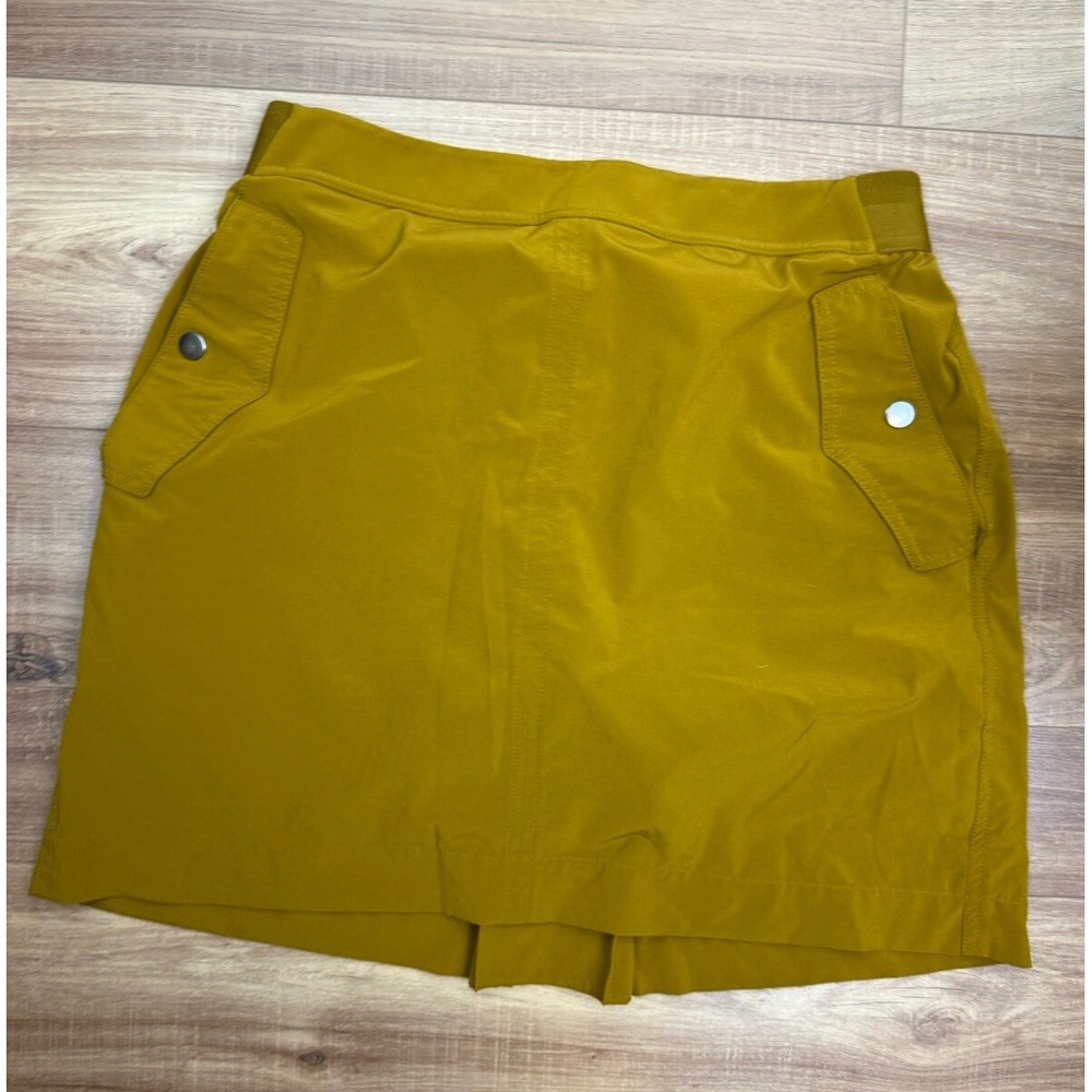 Athleta Skort Womens 12 Brass Mustard Vienna Cargo Commuting Work Travel Golf